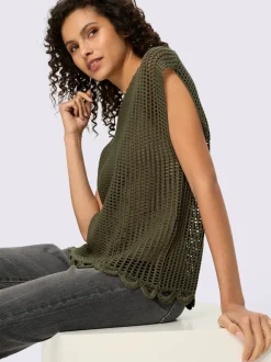 Pull en tricot ajouré avec encolure ronde et bord ondulé