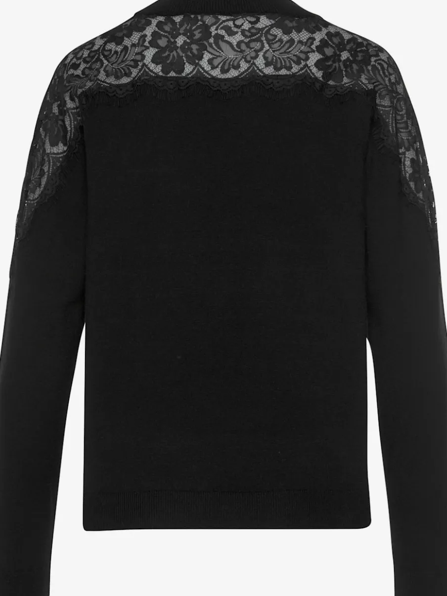 Pull en tricot avec empiècements en dentelle et col rond