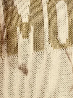 Pull en tricot avec imprimé lumineux et fentes latérales