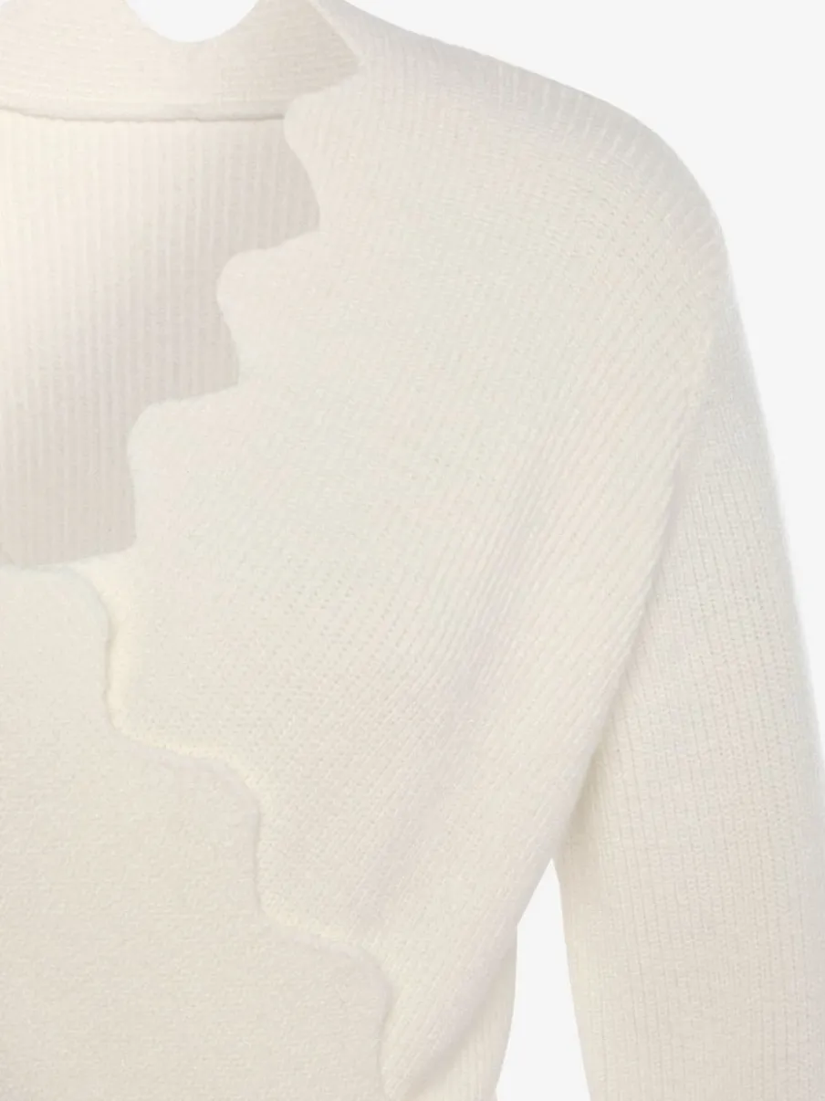 Pull en tricot à bord ondulé avec manches longues et tricot doux