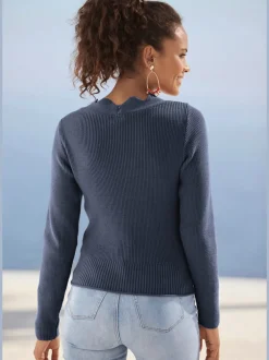 Pull en tricot à bord ondulé avec manches longues et tricot doux