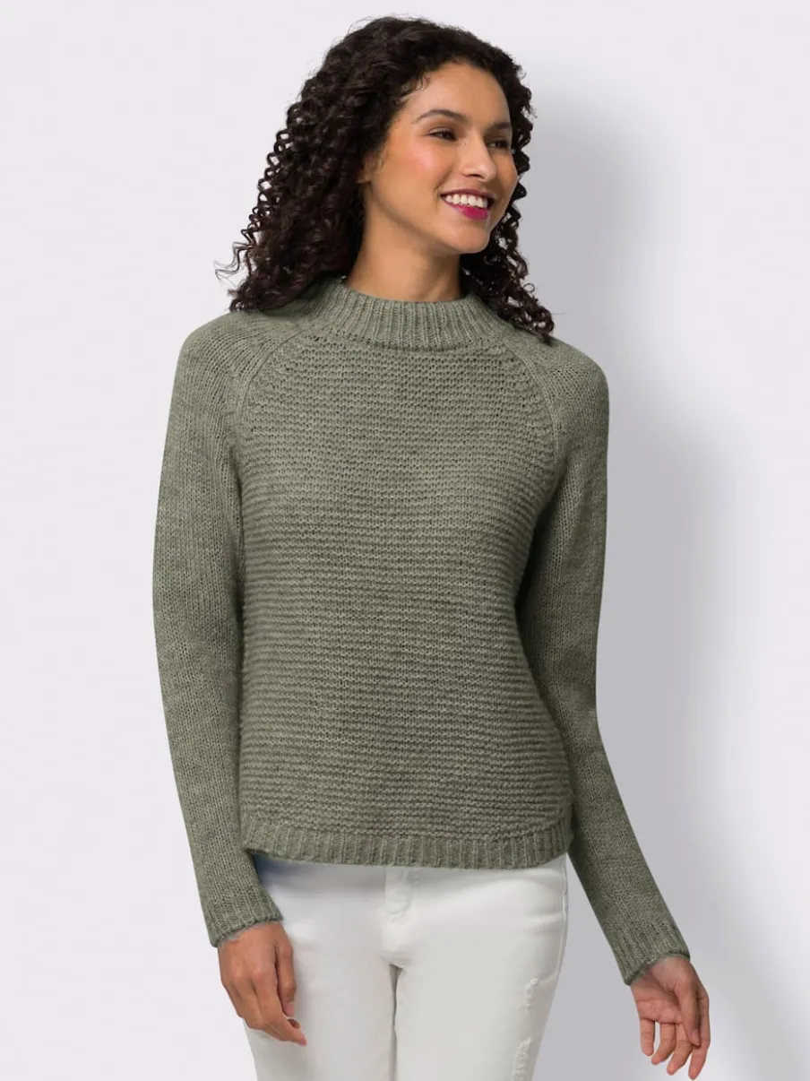 Pull en tricot col montant à manches trois-quarts et bords-côtes