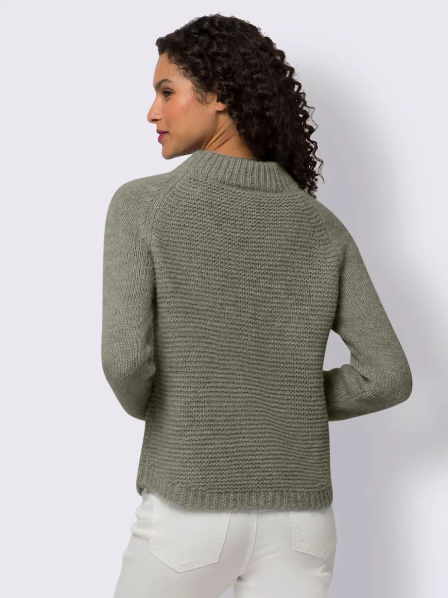 Pull en tricot col montant à manches trois-quarts et bords-côtes