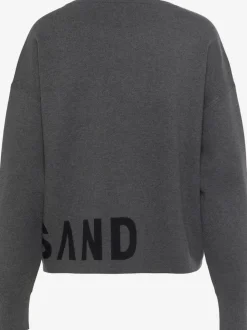 Pull en tricot doux avec encolure ronde et manches longues