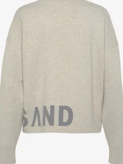 Pull en tricot doux avec encolure ronde et manches longues