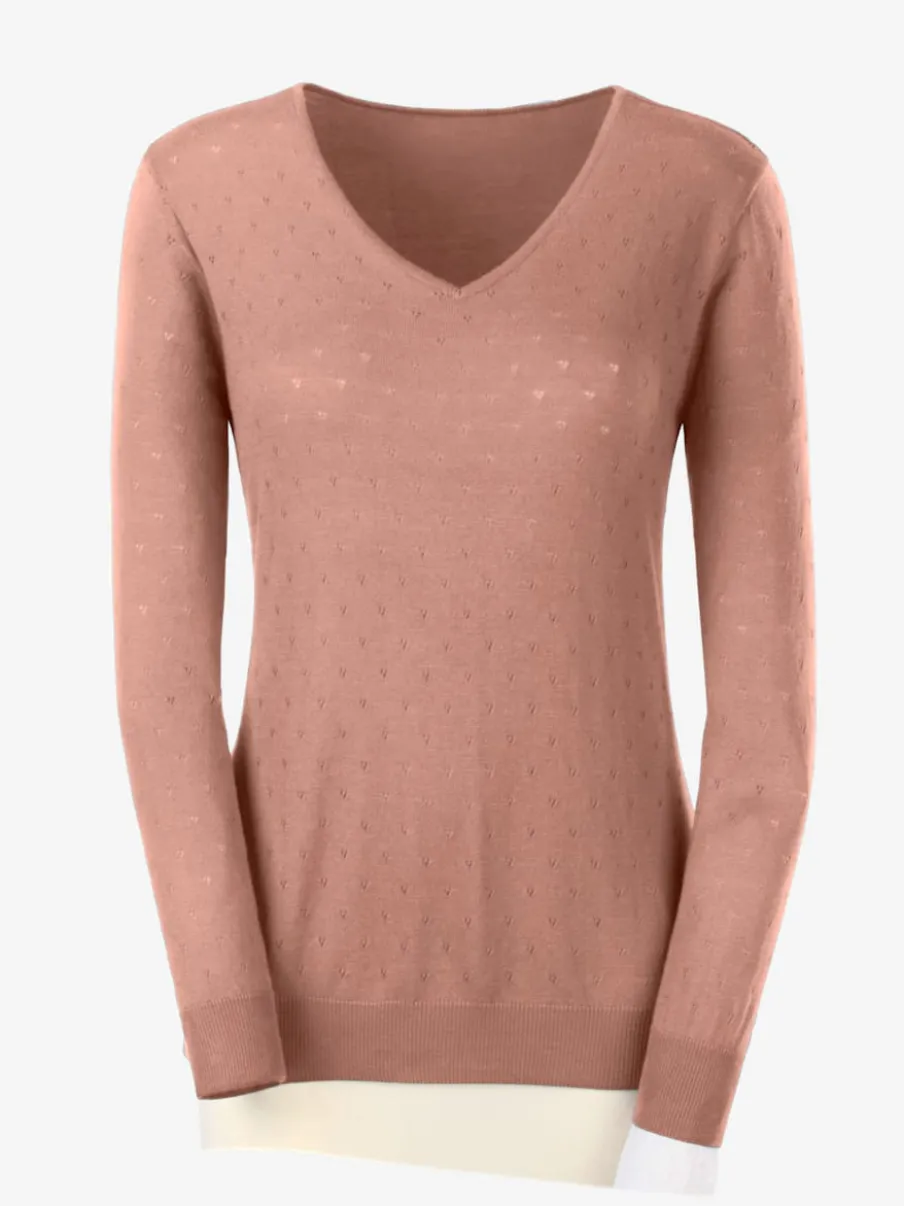 Pull en tricot doux col en V motif ajouré.