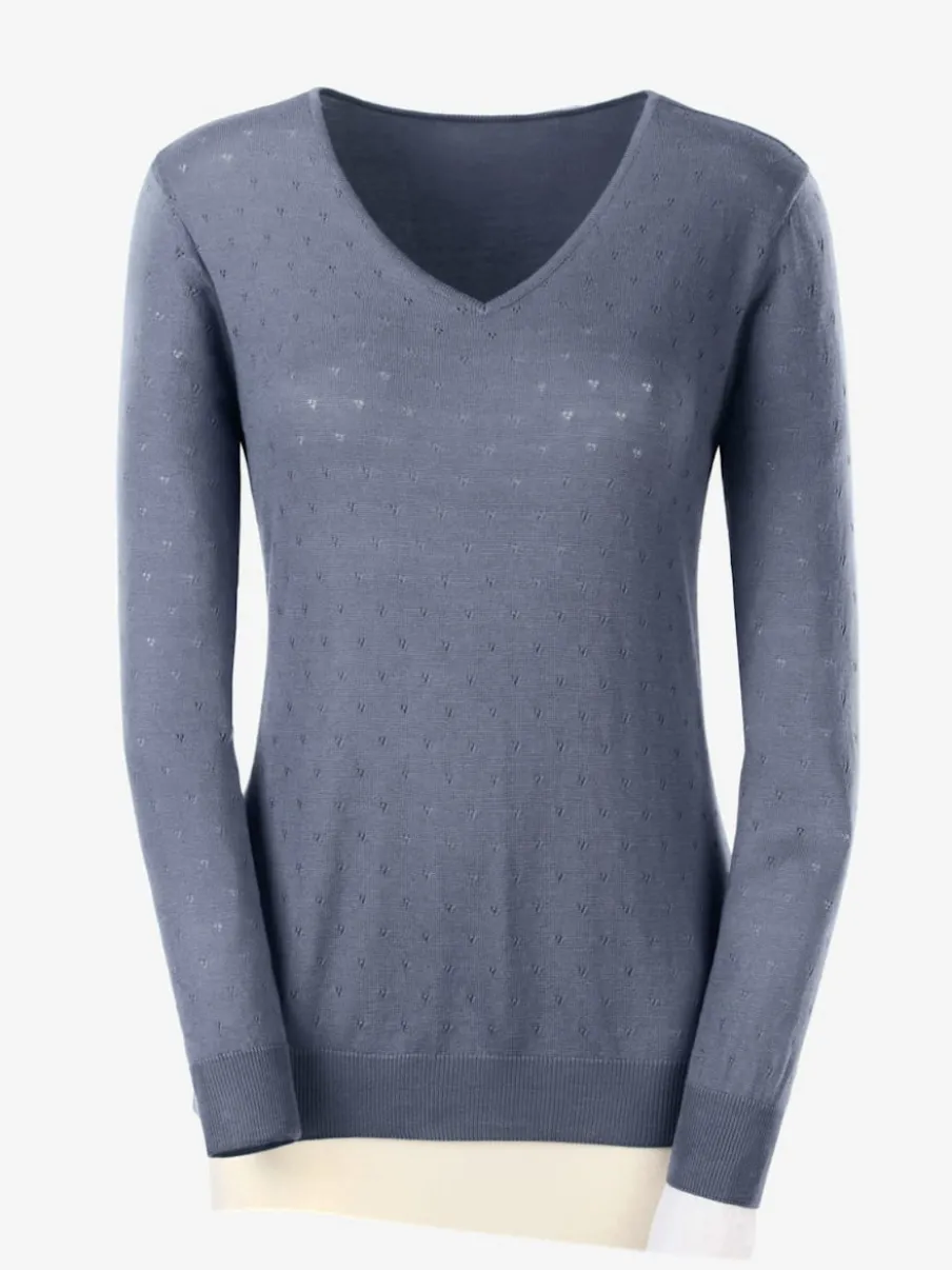 Pull en tricot doux col en V motif ajouré.