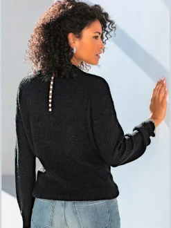 Pull en tricot à encolure en V avec perles et fente au dos