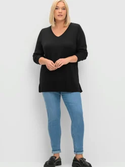 Pull en tricot fentes latérales