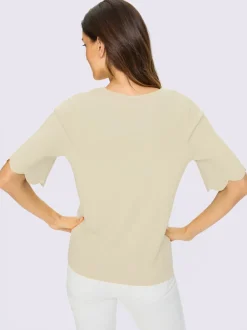 Pull en tricot fin avec encolure carrée et manches chauve-souris
