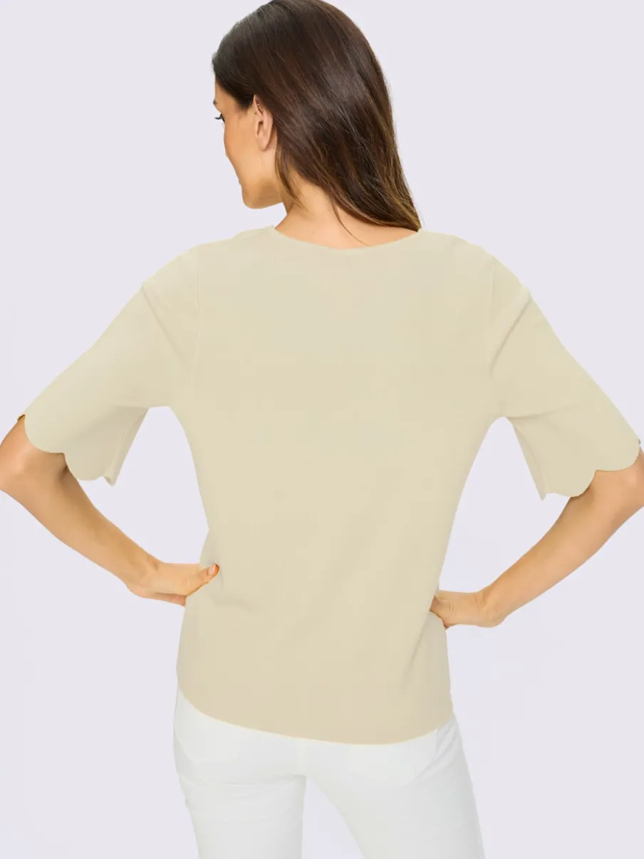 Pull en tricot fin avec encolure carrée et manches chauve-souris
