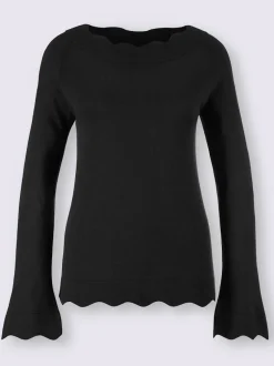 Pull en tricot fin avec encolure en U et ourlet