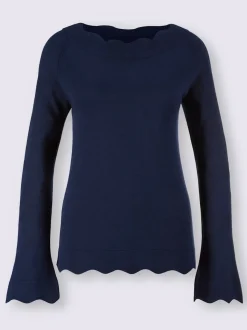 Pull en tricot fin avec encolure en U et ourlet