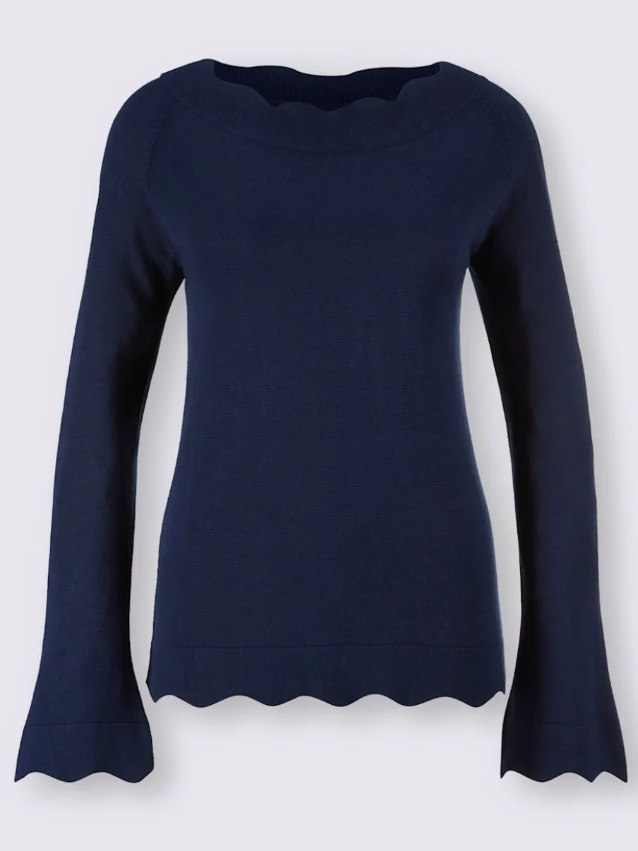 Pull en tricot fin avec encolure en U et ourlet