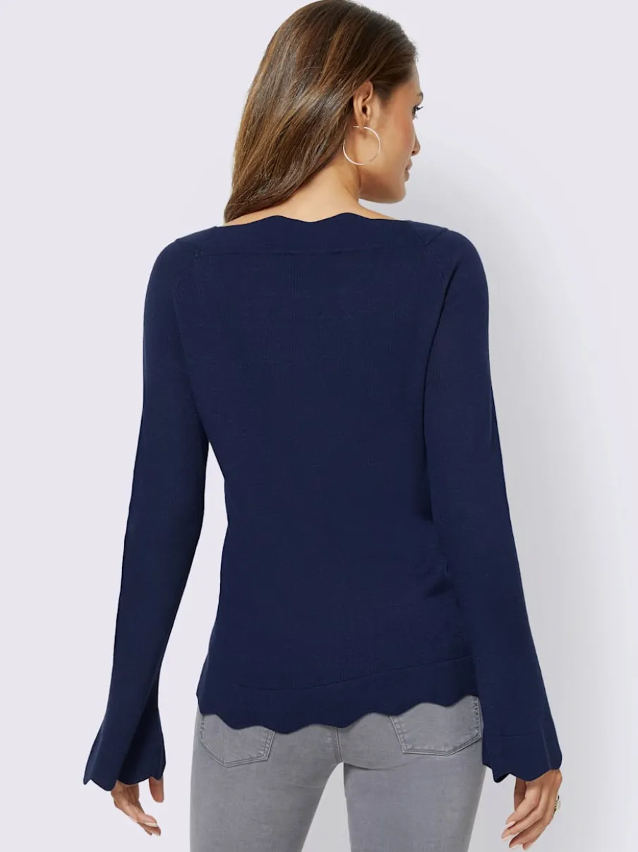 Pull en tricot fin avec encolure en U et ourlet