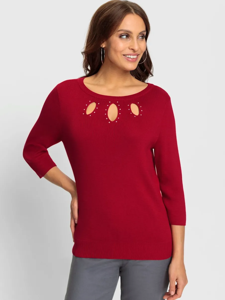 Pull en tricot fin avec encolure U et découpes