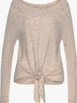 Pull en tricot léger avec col bateau et nœud à l'ourlet