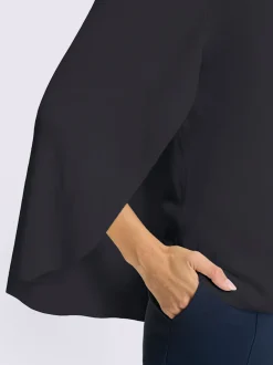 Pull en tricot poncho avec col rond et ourlet arrondi