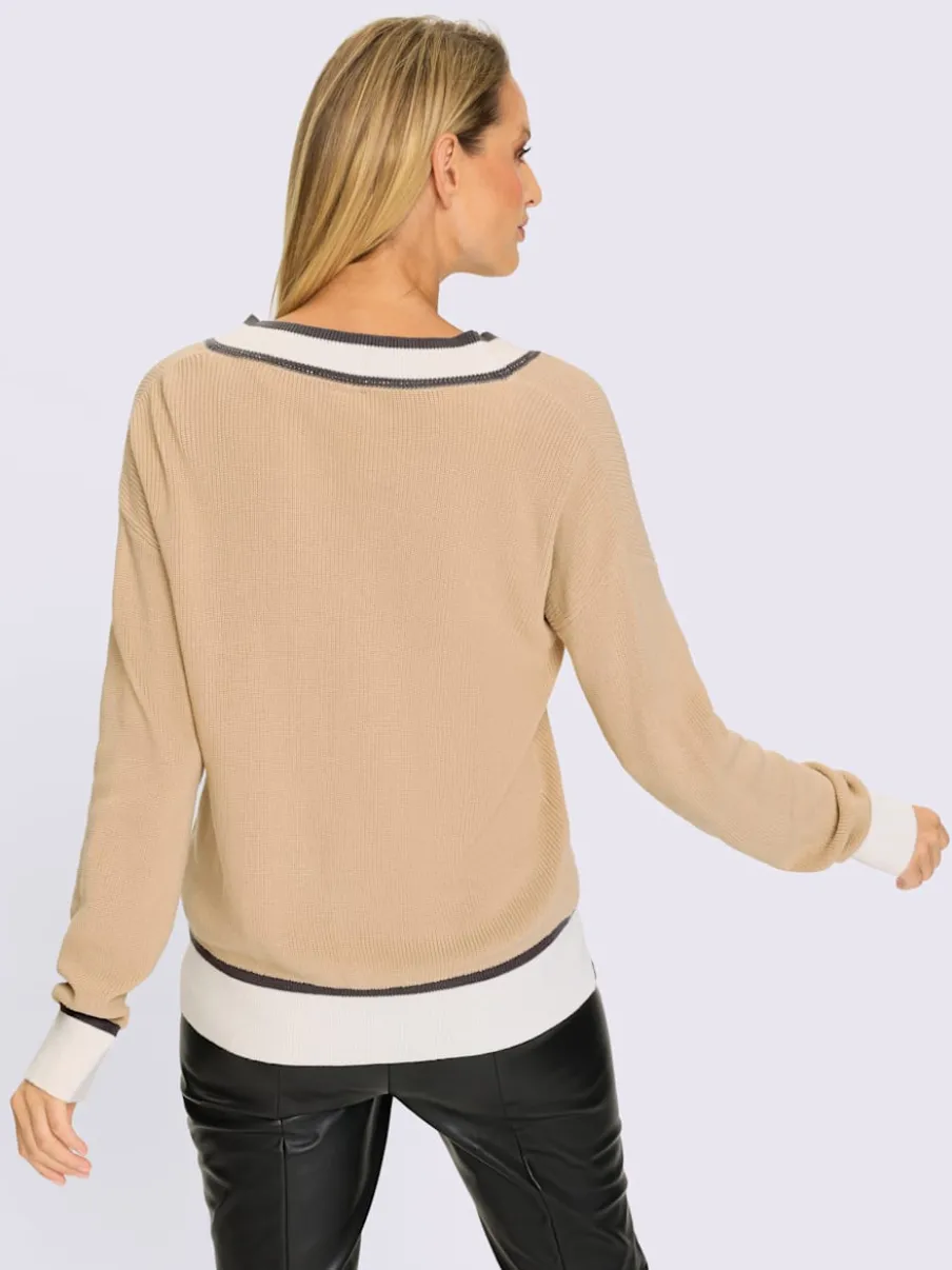 Pull en V en coton avec rayures contrastées et pierres brillantes