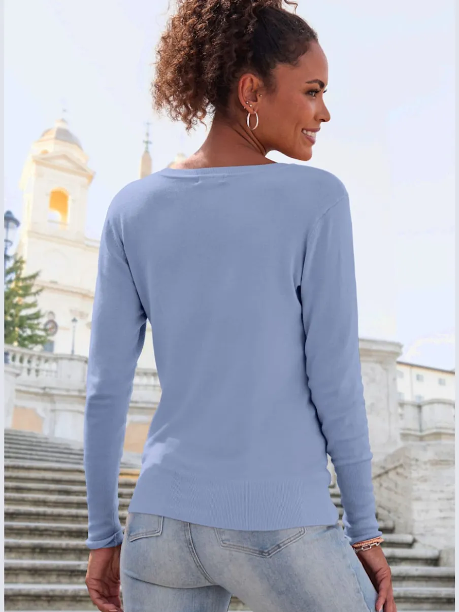 Pull en V à manches longues et bord-côtes avec finition raffinée