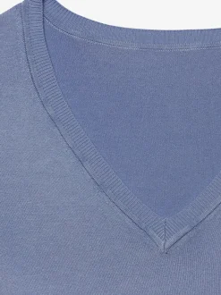 Pull en V à manches longues et bord-côtes avec finition raffinée