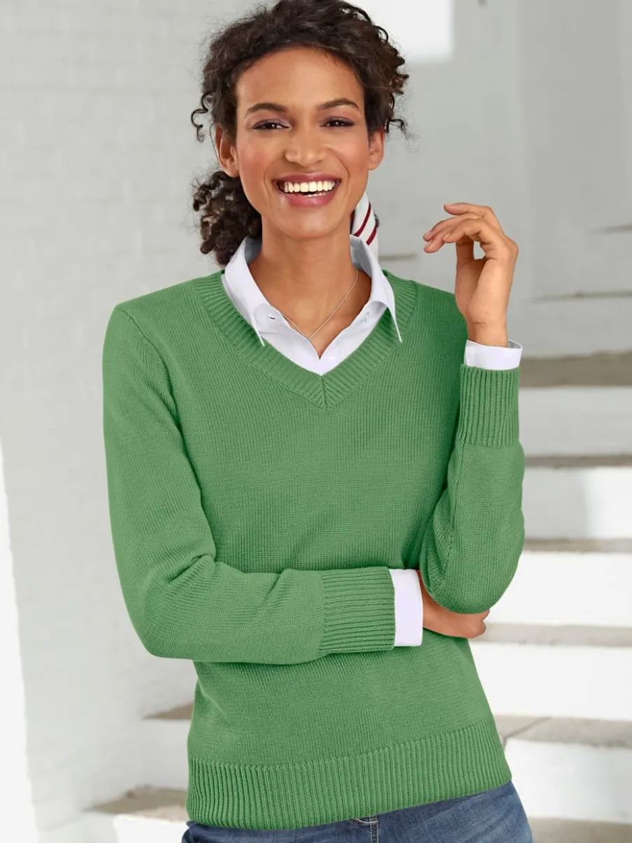 Pull femme col en v classique et finition côtelée