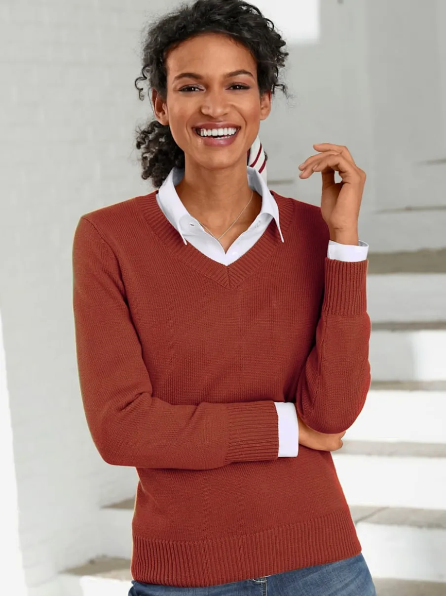 Pull femme col en v classique et finition côtelée