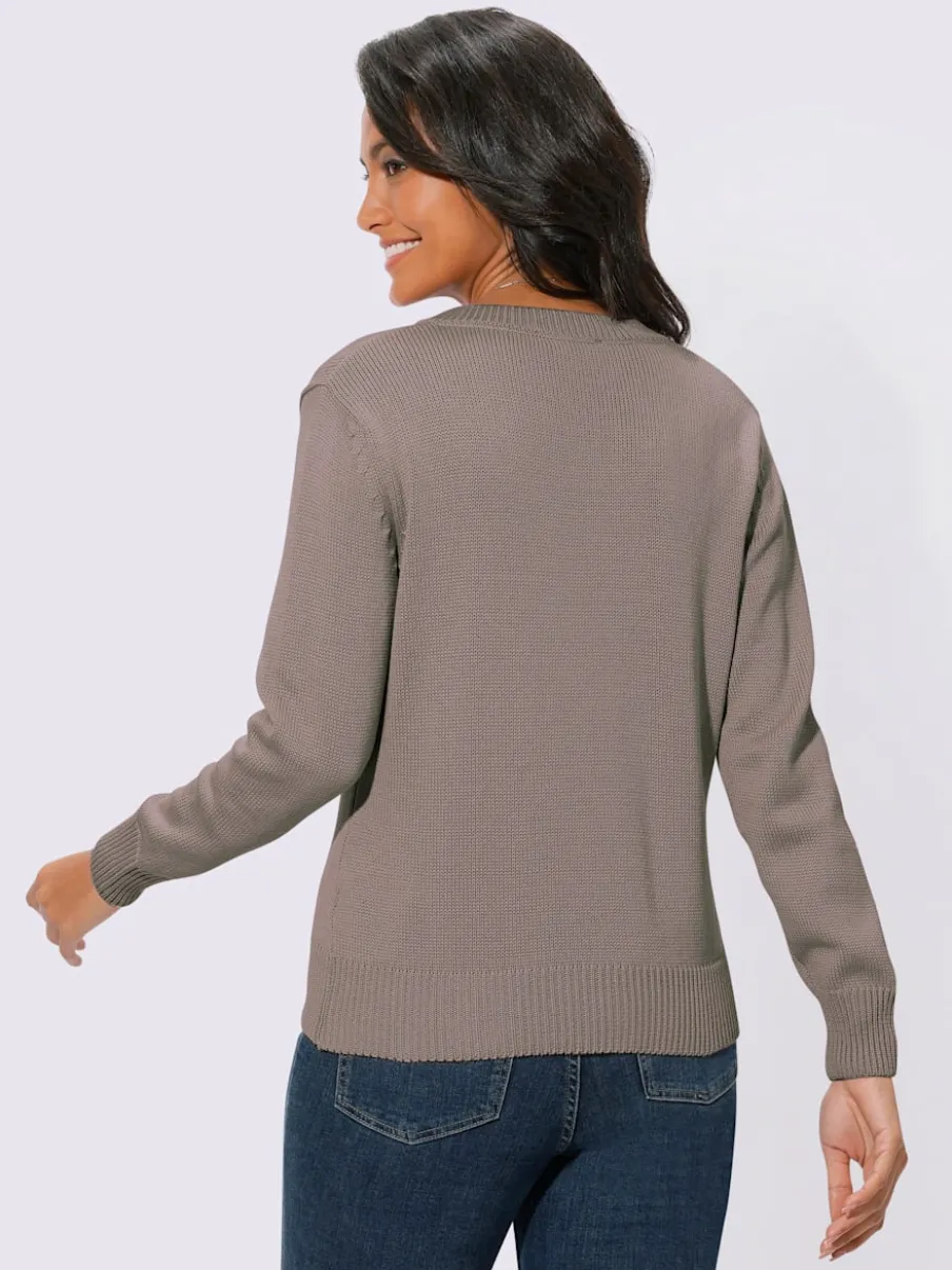 Pull femme col en v classique et finition côtelée