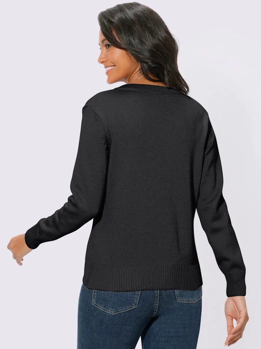Pull femme col en v classique et finition côtelée