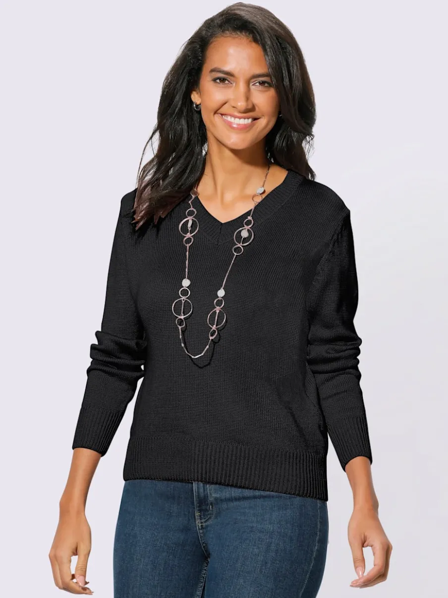 Pull femme col en v classique et finition côtelée