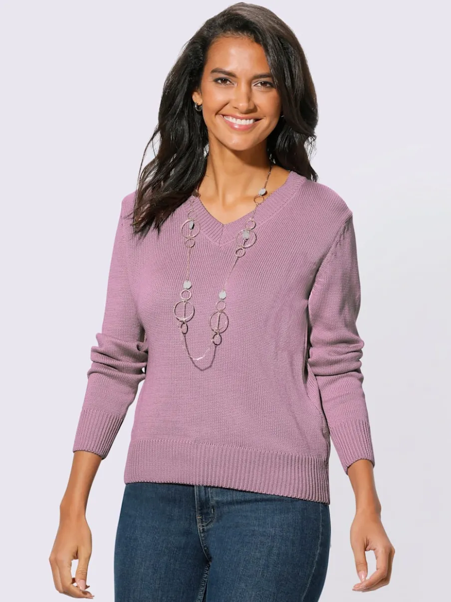 Pull femme col en v classique et finition côtelée