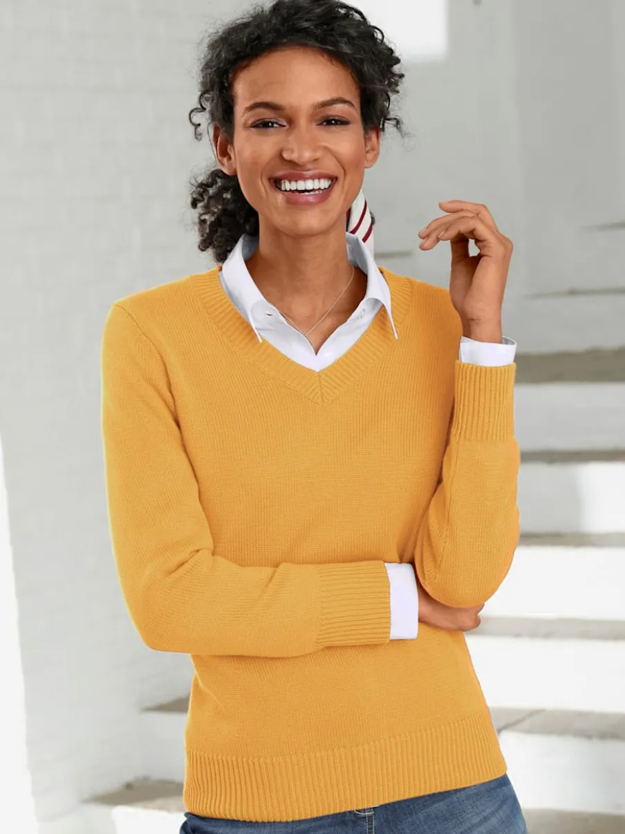 Pull femme col en v classique et finition côtelée
