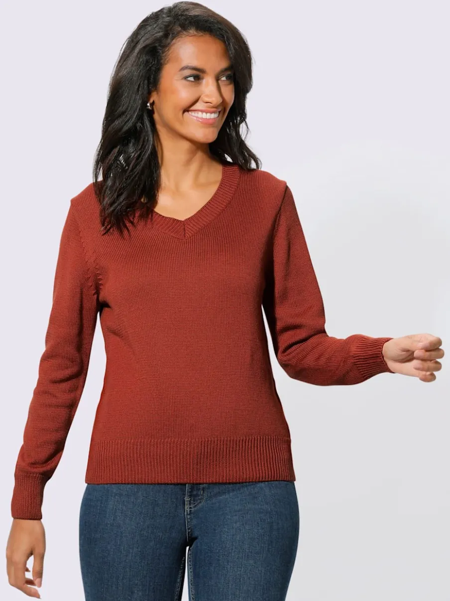 Pull femme col en v classique et finition côtelée