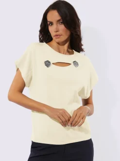 Pull à fleurs et découpes avec encolure en U