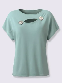 Pull à fleurs et découpes avec encolure en U