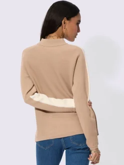 Pull jacquard avec col montant et manches chauve-souris