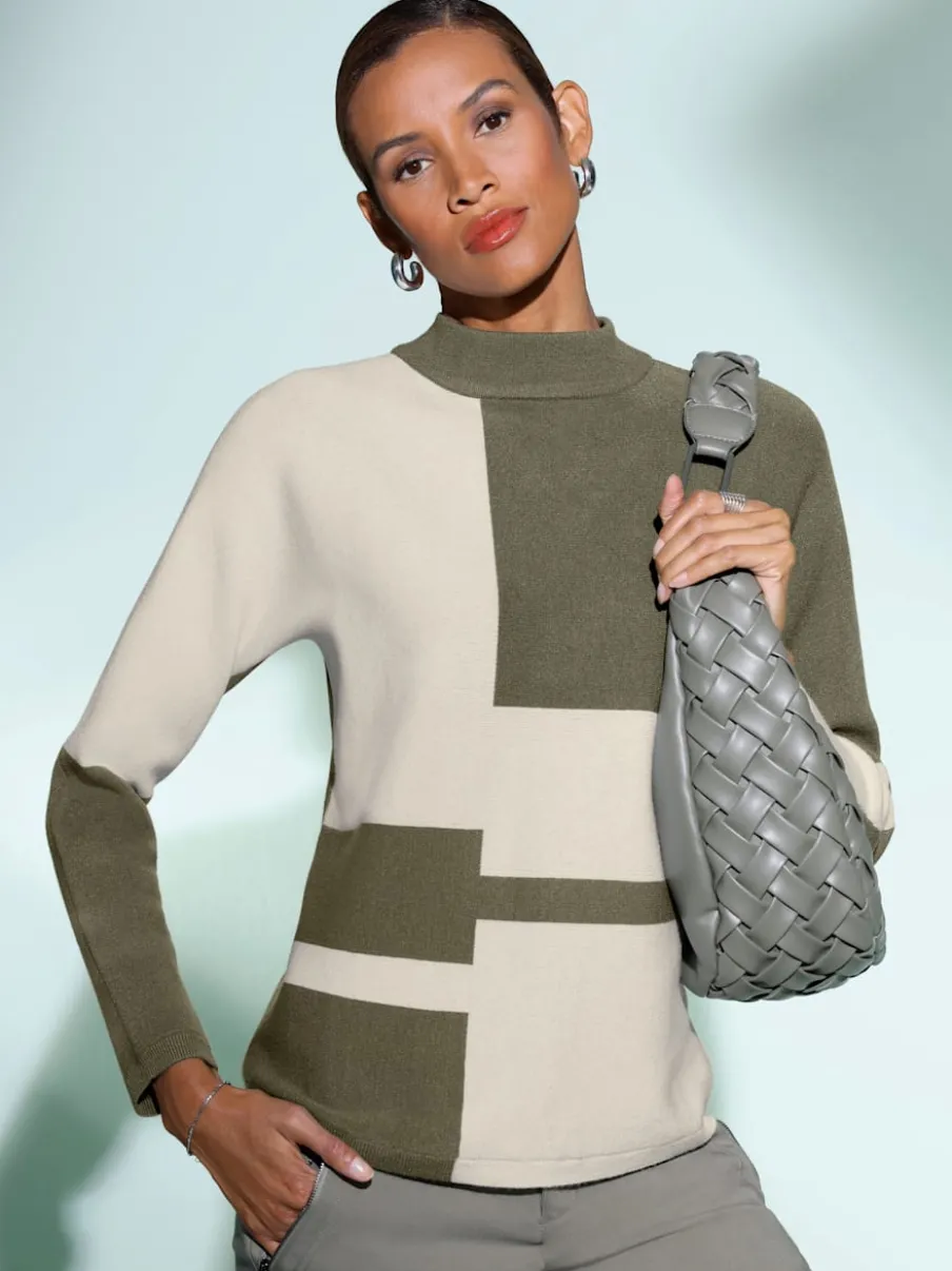 Pull jacquard avec col montant et manches chauve-souris