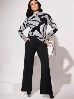 Pull jacquard à col châle et manches longues avec motif floral