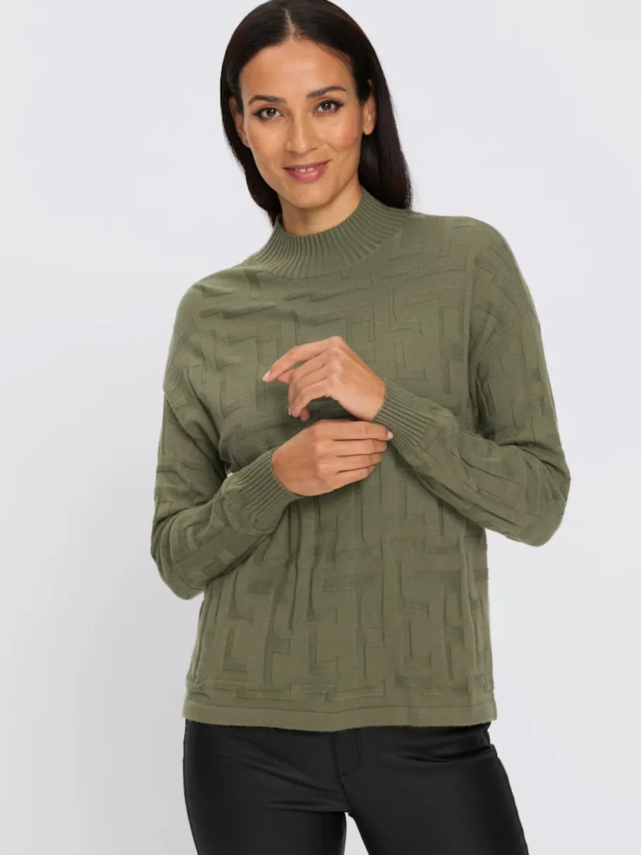 Pull jacquard motif tricoté col montant manches longues