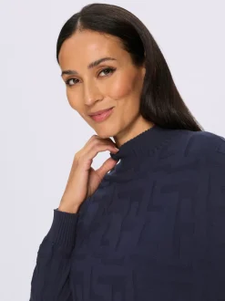 Pull jacquard motif tricoté col montant manches longues