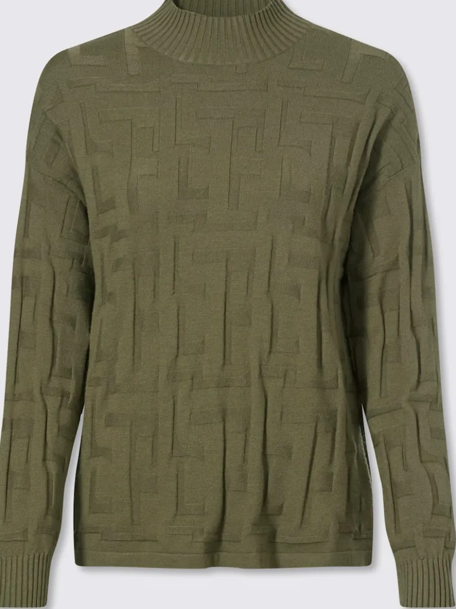 Pull jacquard motif tricoté col montant manches longues