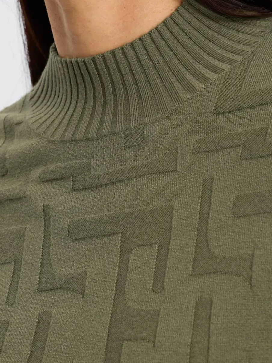 Pull jacquard motif tricoté col montant manches longues