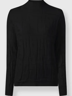 Pull jacquard motif tricoté col montant manches longues