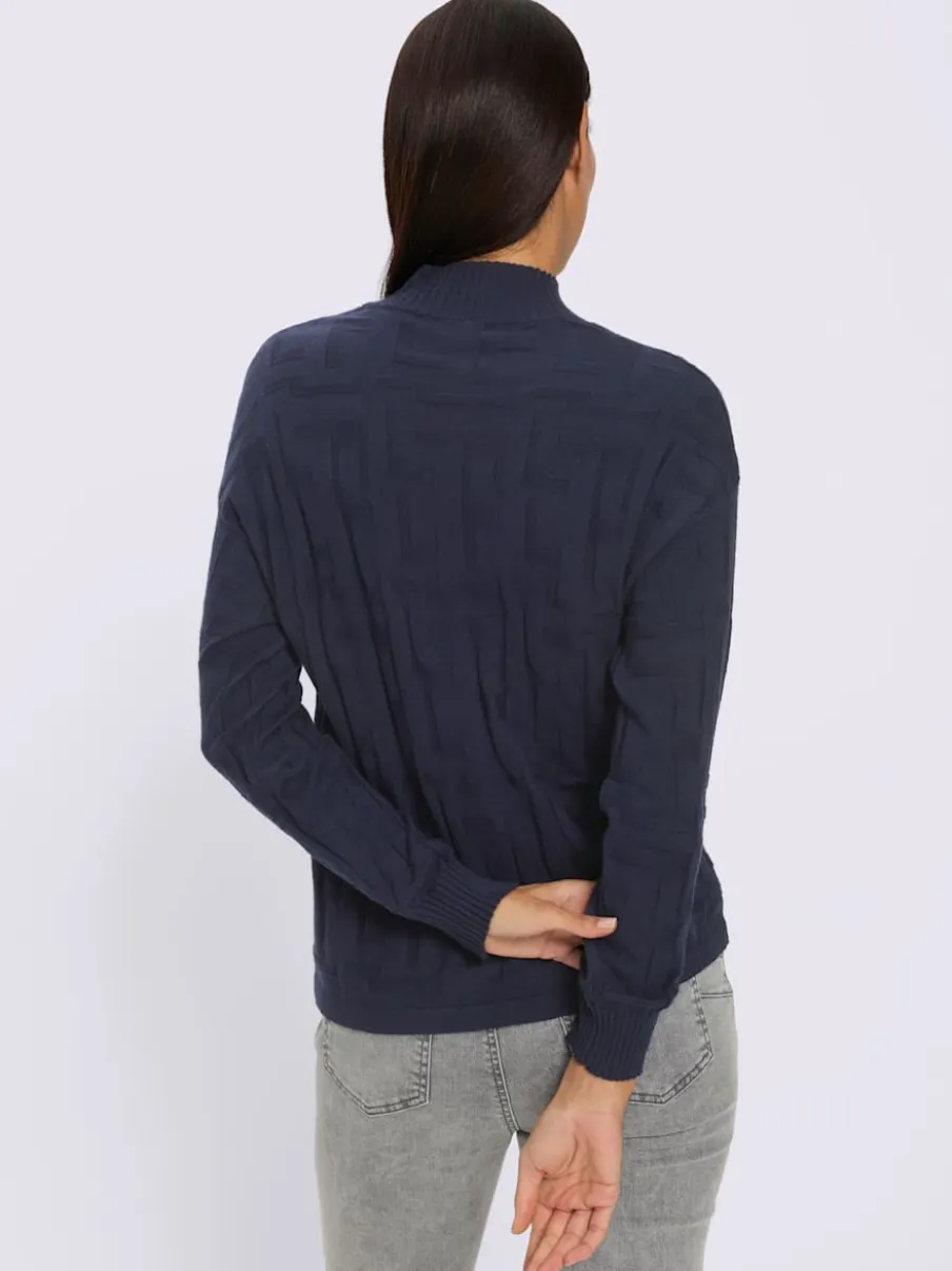 Pull jacquard motif tricoté col montant manches longues