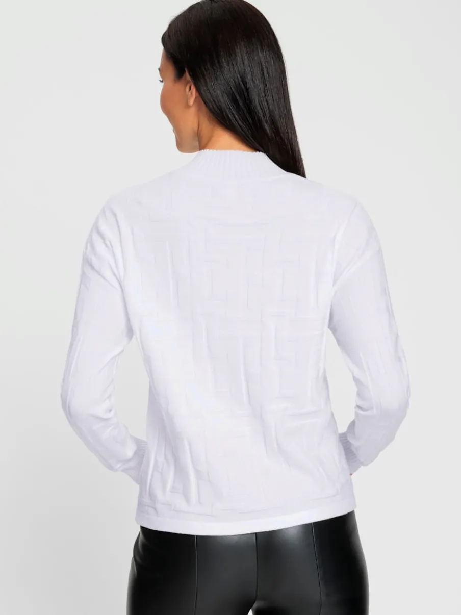Pull jacquard motif tricoté col montant manches longues