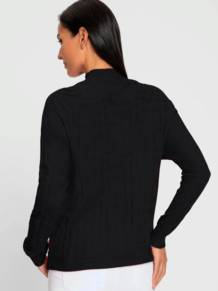 Pull jacquard motif tricoté col montant manches longues
