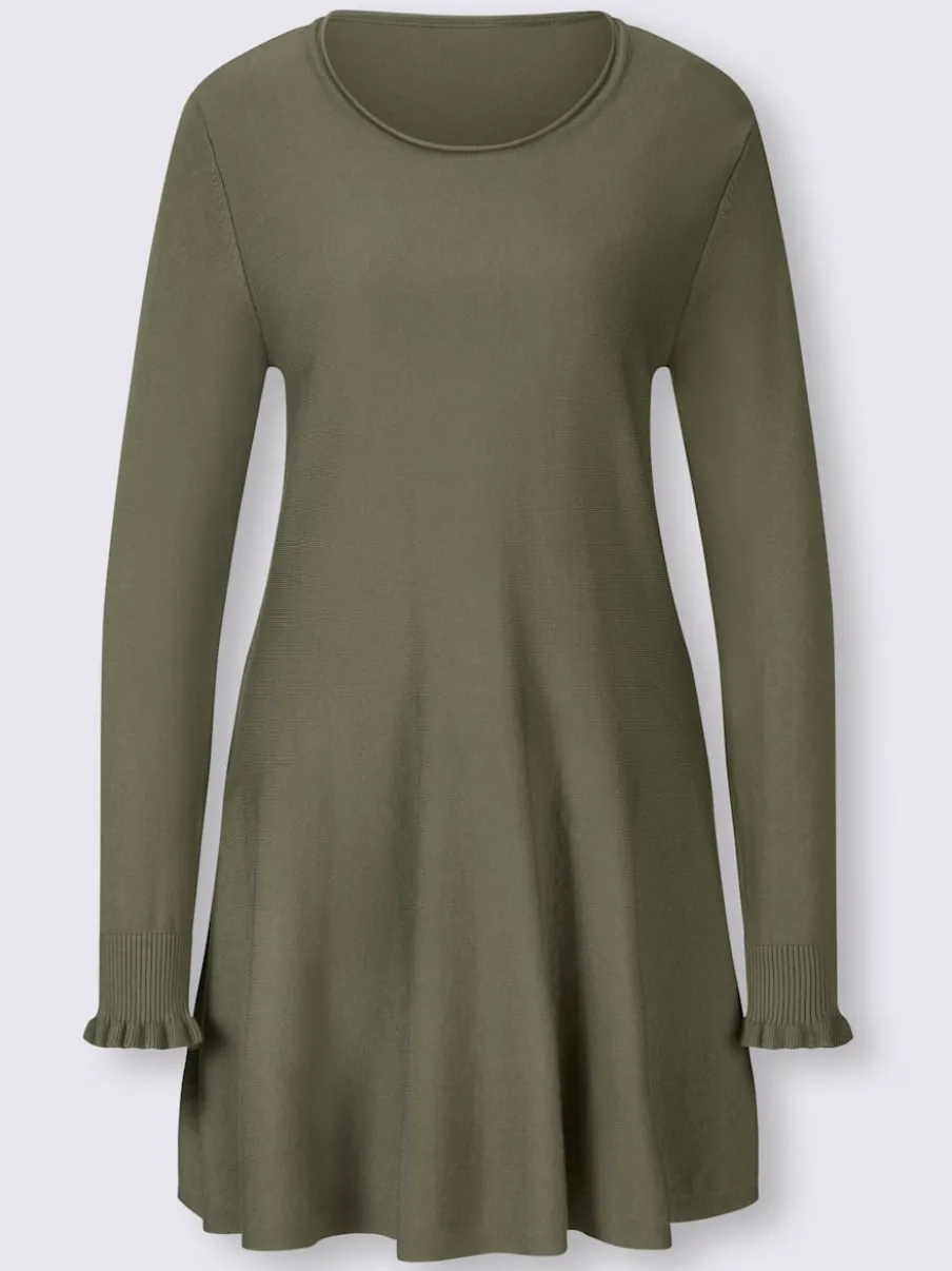 Pull long légèrement évasé avec bords roulés et volants