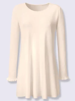 Pull long légèrement évasé avec bords roulés et volants