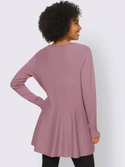 Pull long légèrement évasé avec bords roulés et volants
