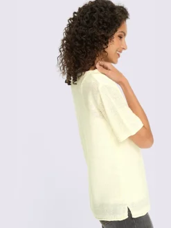 Pull à manches courtes avec encolure ronde et fentes latérales